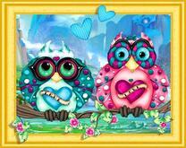 Милые совы на ветке