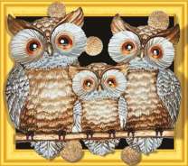 Совиная семья на веточке