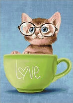 Котенок в зеленой чайной чашке
