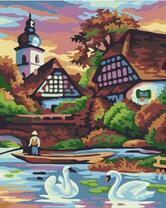 Лебеди на реке в деревне