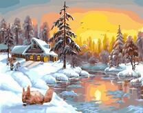 Домик в зимнем лесу на закате