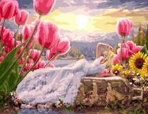 Девушка в белом платье на поле цветов