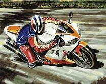 Мотоциклист мчит по дороге