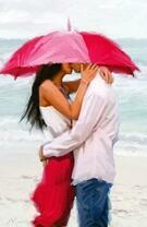 Счастливый поцелуй на берегу моря