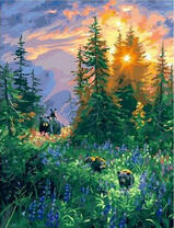 Медведица с потомством на горных склонах