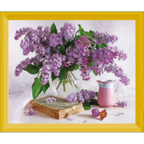 Сирень в прозрачной вазе и кофейник