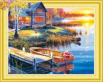 Домик у озера и яркий рассвет