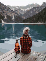 Девушка и кошка на берегу озера Брайес