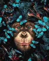 Милая обезьянка и голубые бабочки