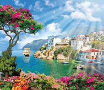 Прибрежный город в солнечных лучах