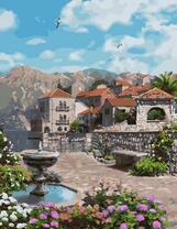 Дворик с фонтаном на фоне гор