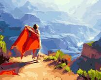 Девушка с оранжевой шалью на вершине горы