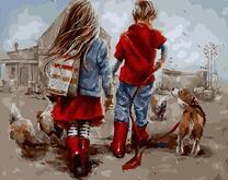 Мальчик и девочка гуляют с собакой