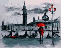 Пара под красном зонтом на фоне старого города