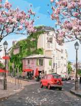 Красная машина на весенней улице