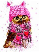 Сова в вязанной шапочке и шарфе