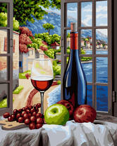 Вино и фрукты на фоне гор и моря