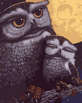 Сова и ее птенец на ветке