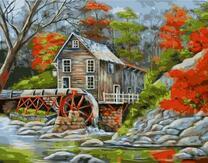 Водяная мельница в осеннем лесу