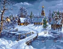 Деревушка в снежном лесу у реки