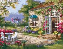 Цветущий дворик у каменного дома