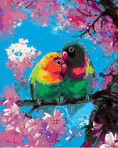 Попугаи неразлучники на цветущей ветке