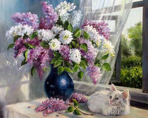 Белый котеночек под букетом сирени