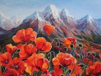 Цветущие маки на фоне снежных гор