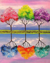 Три дерева разного цвета у озера