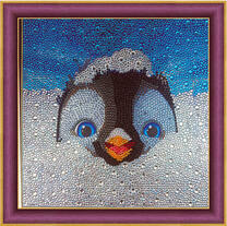 Маленький пингвин в снегу