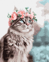 Голубоглазая кошечка в цветочном венке