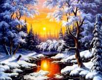 Закат солнца в зимнем лесу