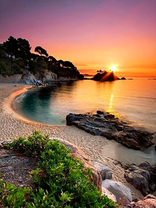 Закат над песчаным пляжем