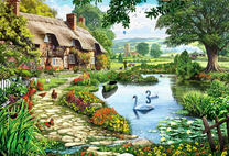 Домик у озера с лебедями