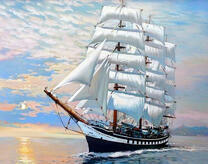 Черно-белый парусник на спокойной глади моря