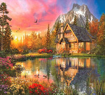 Дом с озером среди гор