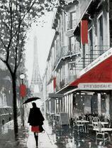 Девушка под черным зонтом в осеннем Париже