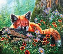 Лисенок на полянке с цветами под деревом