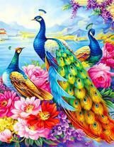 Три павлина в цветах на берегу озера