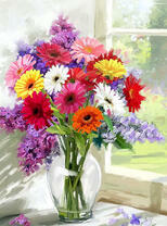 Разноцветные герберы в прозрачной вазе