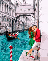 Страстный поцелуй у канала в Венеции