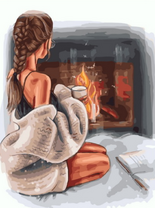 Девушка в теплом свитере возле камина