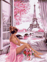 Нежная девушка в розовом платье и вид на Эйфелеву башню