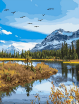 Ключ птиц над рекой у подножья гор