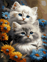 Маленькие котята среди желто-синих цветов