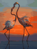 Два фламинго на фоне заката