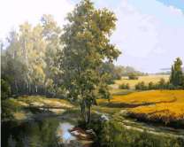 Деревянный мост через реку у поля пшеницы