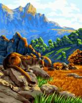 Пума в горах осенью