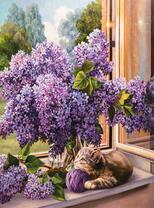 Котёнок с клубком под букетом сирени