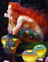 Рыжеволосая русалка на берегу